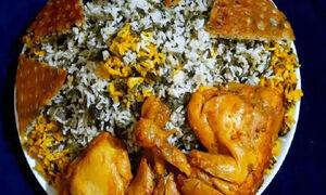  تاک پلو شاهرودی؛ پلوی خوش‌عطر و ملس با برگ مو و مرغ